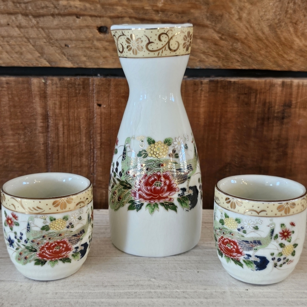 Vintage ceramic sake carafe & 2 cups cream crackle glaze peacocks/flowers